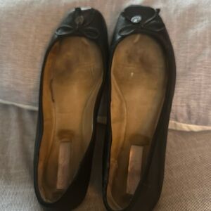 Black leather ballet flats